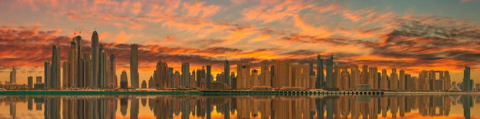 Panoramic view of Dubai Marina bay at sunset, UAE