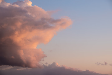 Red sky clouds background. Beautiful landscape with clouds and orange sun on sky