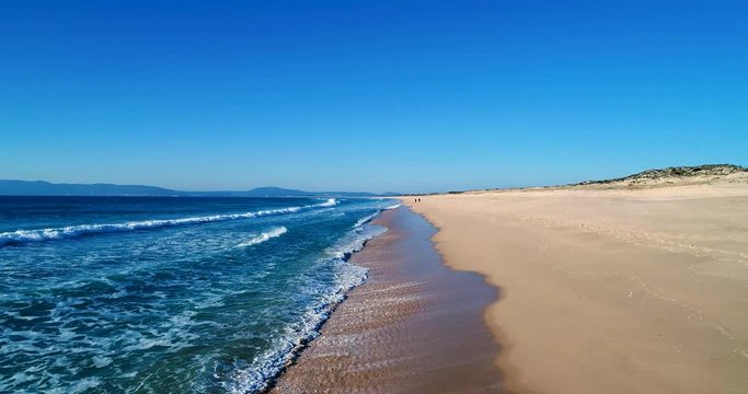 Aerial slow motion of the Comporta Beach in the Troia Peninsula, Portugal
