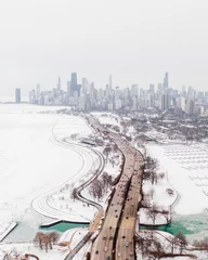 Tuinposter Chicago Polar Vortex aerial view of Lake Shore Drive © Ionel
