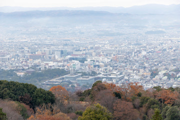 Misty day over Nara City, Wide view with Autumn mountains 