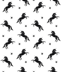 Vector seamless pattern of hand drawn doodle sketch black unicorn isolated on white background