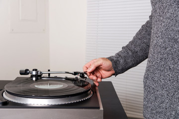 music fan listens to records