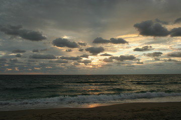 Naklejka na ściany i meble Dramatic Stormy Sky Sunset Reflected on the Ocean Waves
