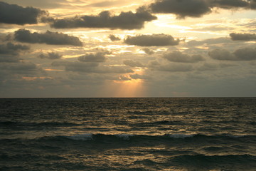 Dramatic Stormy Sky Sunset Over the Ocean Waves