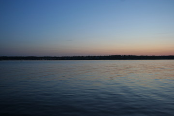 dusky gradient sunset sky reflected in martha's vineyard ocean