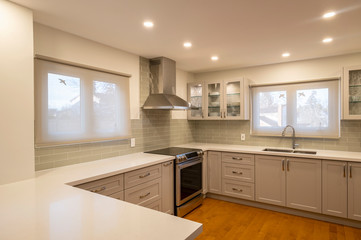 New and Modern Open Concept Kitchen with a Grey and White Color Scheme