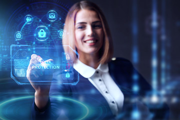 Business, technology, internet and networking concept. Young businessman working  in the office, select the icon Data protection  on the virtual display.