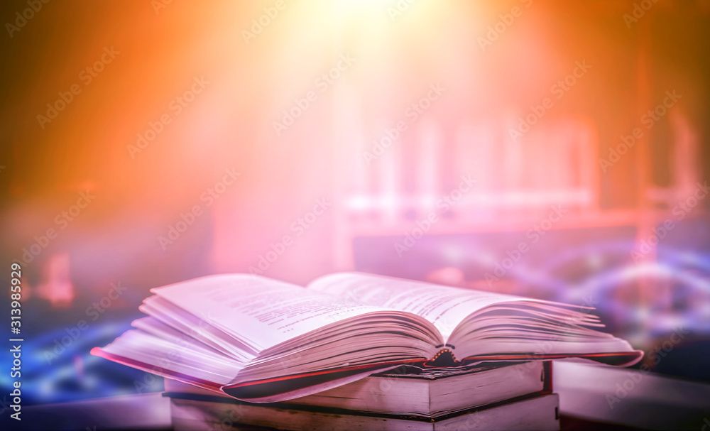 Poster stack of books in the library and blur bookshelf background