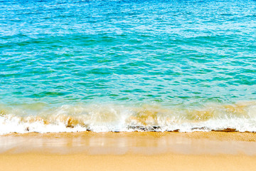 sea wave surf cover sand coast by slow tranquil blue water