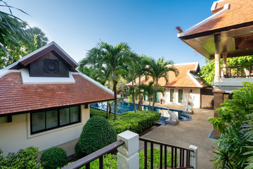 Thai Balinese  luxury home with infinity swimming pool , night time