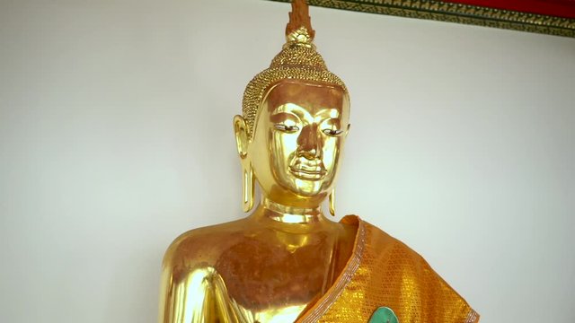 Beautiful Golden Buddha Head at Wat Pho in Bangkok, Thailand.