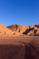 Fototapeta na wymiar Wadi Ram desert with car., Red sand Dune in the Wadi Ram desert. Jordan landscape