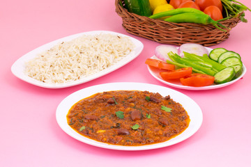 Rajma Chawal or Rajma Jeera Chawal (Rice) is a Traditional North Indian Food, Consisting of Cooked Red Kidney Beans in a Thick Gravy with Spices. Served with Jeera Rice