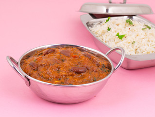Rajma Chawal or Rajma Jeera Chawal (Rice) is a Traditional North Indian Food, Consisting of Cooked Red Kidney Beans in a Thick Gravy with Spices. Served with Jeera Rice