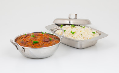 Rajma Chawal or Rajma Jeera Chawal (Rice) is a Traditional North Indian Food, Consisting of Cooked Red Kidney Beans in a Thick Gravy with Spices. Served with Jeera Rice