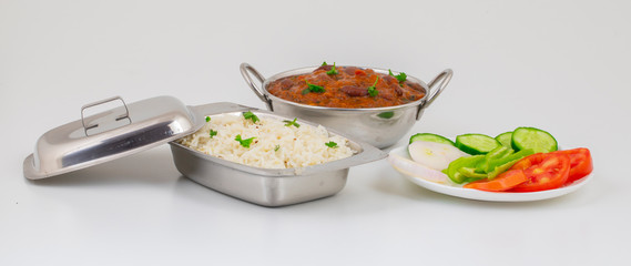 Rajma Chawal or Rajma Jeera Chawal (Rice) is a Traditional North Indian Food, Consisting of Cooked Red Kidney Beans in a Thick Gravy with Spices. Served with Jeera Rice