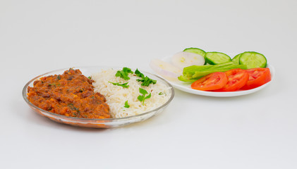 Rajma Chawal or Rajma Jeera Chawal (Rice) is a Traditional North Indian Food, Consisting of Cooked Red Kidney Beans in a Thick Gravy with Spices. Served with Jeera Rice