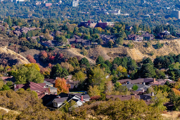 Residential houses on mountain slopes on a sunny day