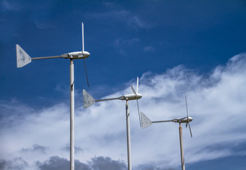 wind turbines on blue sky