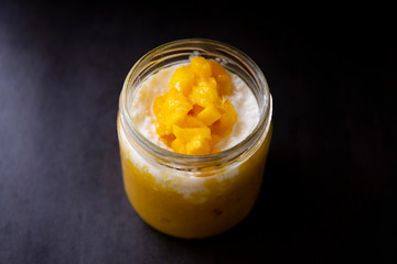 Sweet tapioca pudding with coconut milk and fresh mango