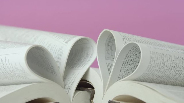 Book of love, the book page rolls into the heart - Valentine's day concept