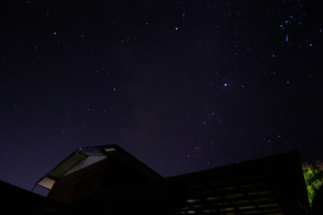 Time lapse of galaxies and meteor at night