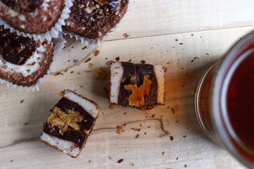 top view of the table with cakes and tea