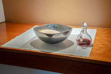 Holy Communion wine and wafers in a church
