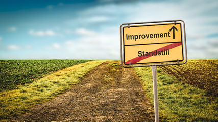 Obraz premium Street Sign to Improvement versus Standstill