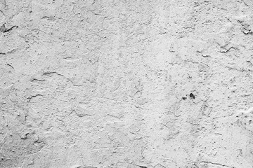 Texture of a concrete wall with cracks and scratches which can be used as a background