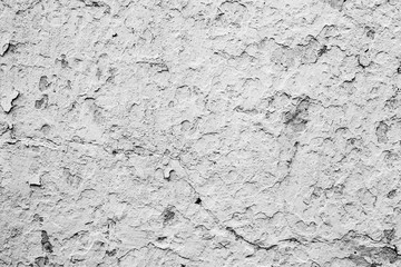 Texture of a concrete wall with cracks and scratches which can be used as a background