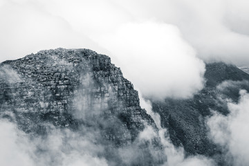 Clouds rolling over Table Mountain in Cape Town, Southafica. This fenomenon is called Tablecloth.