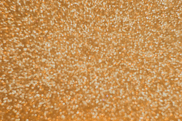 Abstract golden blur glitter background. Defocus background.