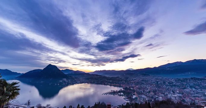 Time lapse del tramonto sulla Citt&agrave; di Lugano - Svizzera - ripresa dal paese di Aldesago