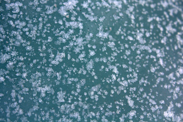 background of snowflakes on a blue background