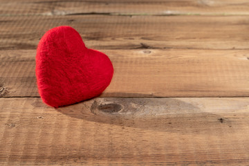 Close up of red hearts on wooden table. St. Valentine's Day background