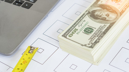 Dollars and computers on the engineers' desks