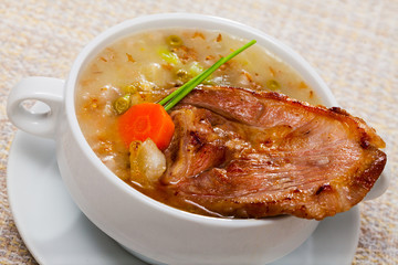 Scotch broth with barley, lamb, vegetables and peas