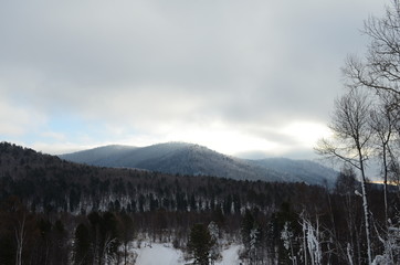Fototapeta premium Winter hills near Angara river source
