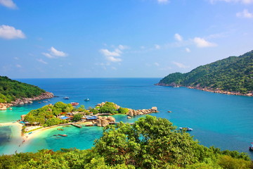 Nang Yuan island near Koh Tao in Suratthani is popular of tourist visit Thailand.dive,scuba.snorkeling into the beautiful sea and blue sky white cloud background.