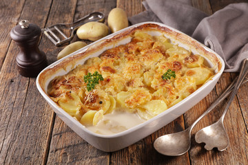 gratin dauphinois, baked potato with cream and cheese