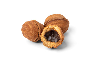 Shortbread in shape nut with caramel isolated on white background.