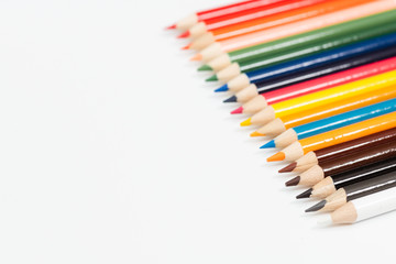 Multi color pencils. the concept of a multinational family and equality in the world.