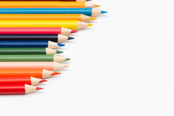 Multi color pencils. the concept of a multinational family and equality in the world.