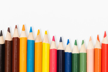 Multi color pencils. the concept of a multinational family and equality in the world.