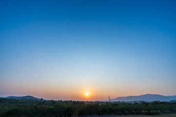 Naklejka premium beautiful blue sky high peak mountains mist fog wildlife green forest at khao yai national park, Nakhon Ratchasima, Saraburi, Thailand guiding idea long weekend for backpacker camping campfire hiking