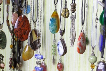 Handmade jewelry made of natural stones. Pendants and pendants made of natural material.