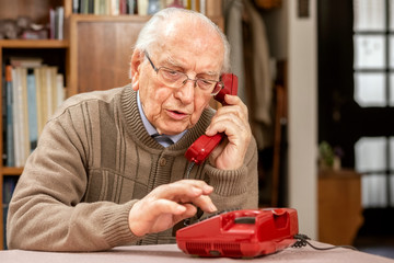 Grandfather with Old Red Button Telephone