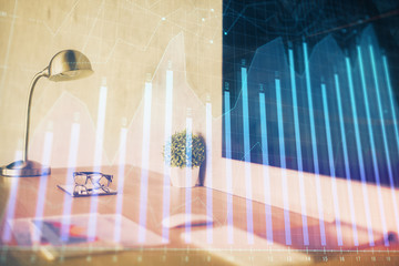 Forex Chart hologram on table with computer background. Double exposure. Concept of financial markets.